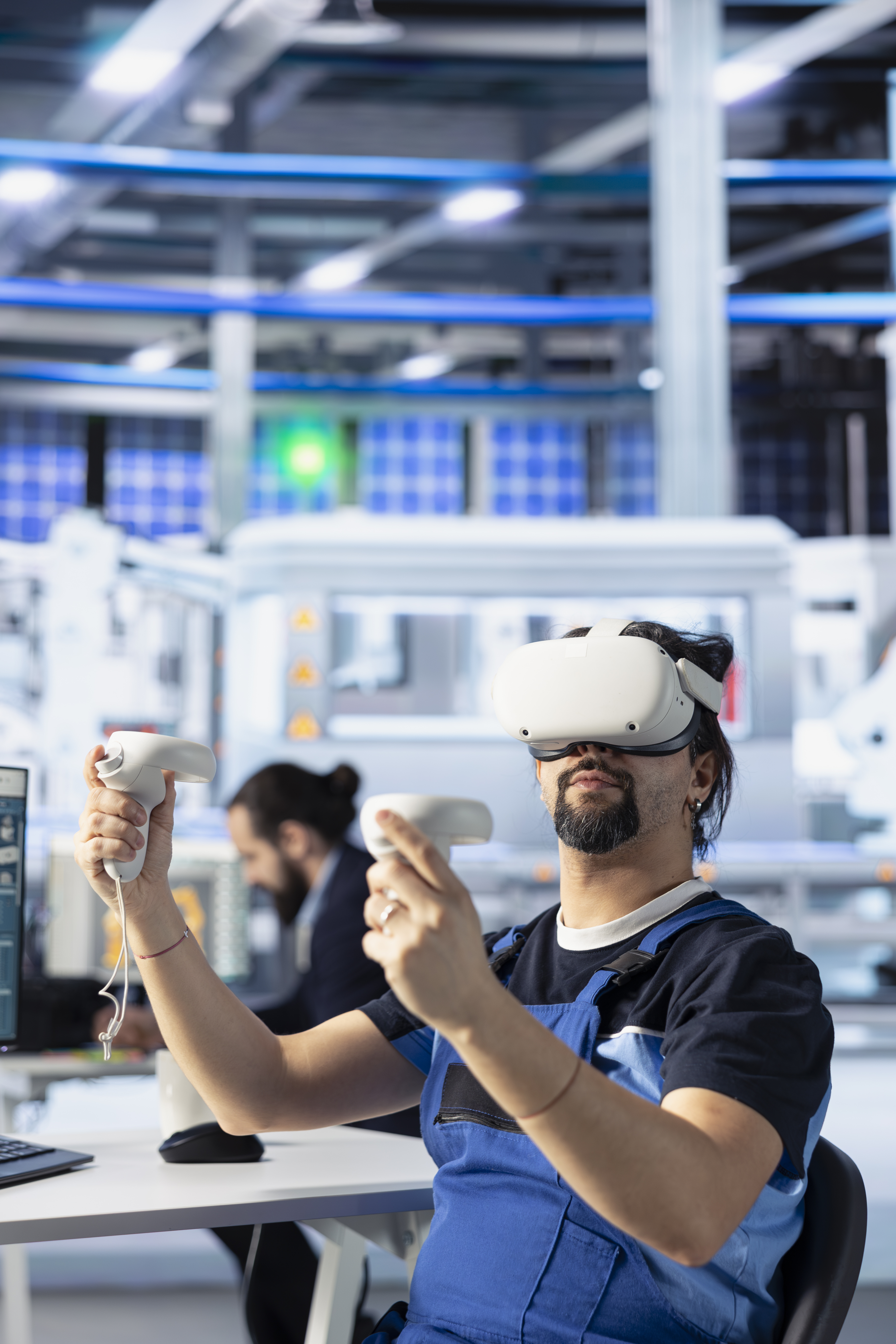 Technician using VR in factory